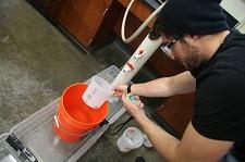 Student conducting fluid mechanics lab